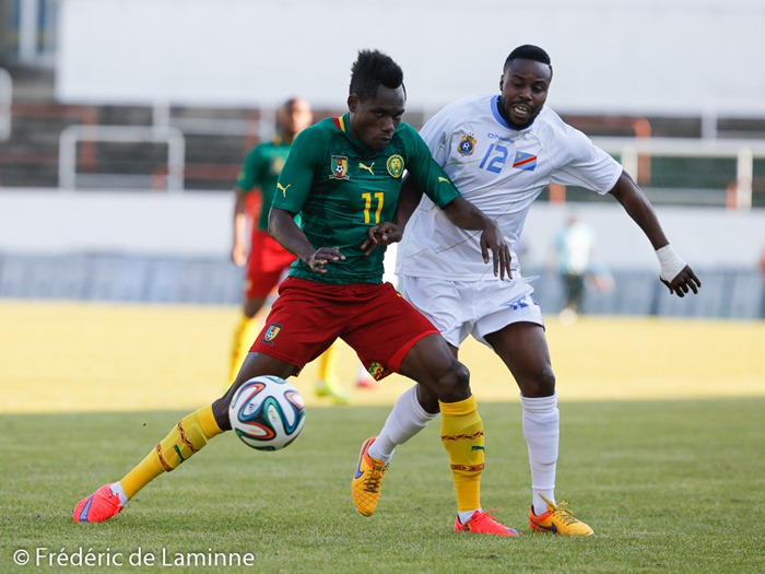 20150609 - Mons, Belgium : Cameroun's forward Justin MENGOLO (#11) and DR Congo's Mid-fielder Toko NZUZI (#12) compete for the ball during the friendly football game between Democratic Replublic of Congo and Cameroun on 09/06/2015 in Mons (Albert)