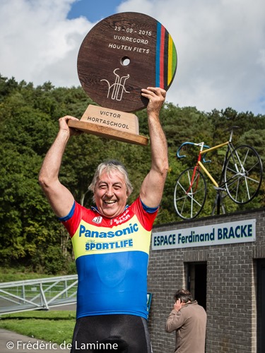 Former Belgian champion Eddy Planckaert set 2 new world records on a wooden bike at the velodrome in Rochefort, Belgium on September 25, 2015. He rode 11,932 km in 1 hour and made the 100m at a speed of 23.334 km/h.